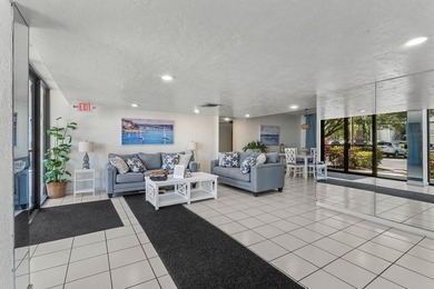 Positioned mere steps from the shoreline, this three-bedroom - photo 29