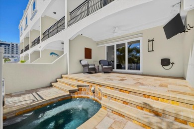 EXQUISITE WATERFRONT TOWNHOME IN THE HEART OF CLEARWATER BEACH
