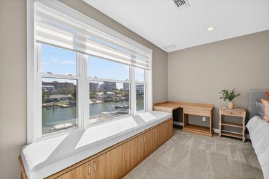 EXQUISITE WATERFRONT TOWNHOME IN THE HEART OF CLEARWATER BEACH
