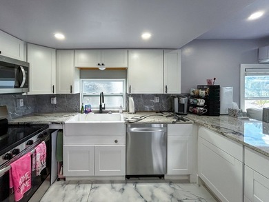 This glamorous waterfront home has been completely reimagined - photo 11
