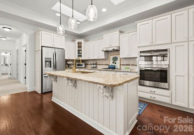 Low-maintenance living meets resort-style amenities in this