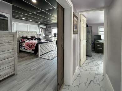 This glamorous waterfront home has been completely reimagined - photo 13