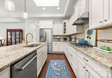 Low-maintenance living meets resort-style amenities in this