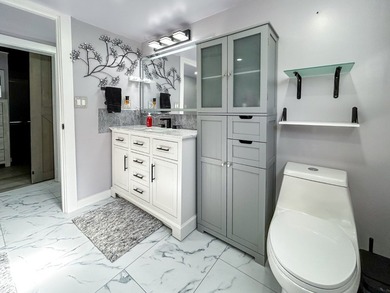 This glamorous waterfront home has been completely reimagined - photo 22