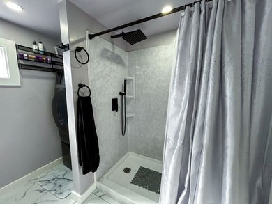 This glamorous waterfront home has been completely reimagined - photo 23