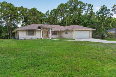 Enjoy peaceful country living in Jupiter Farms with this - photo 2