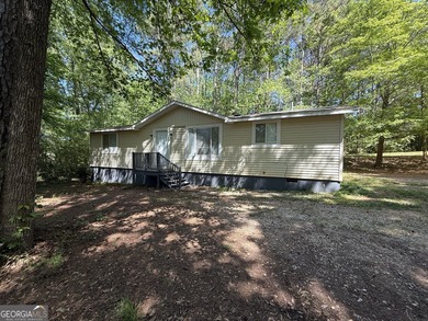 QUIET & FULL OF POTENTIAL! Nestled off the road for ultimate - photo 1