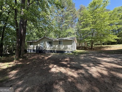 QUIET & FULL OF POTENTIAL! Nestled off the road for ultimate - photo 3