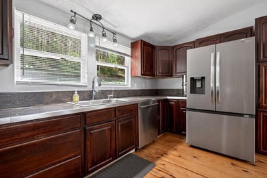 Tucked away on a private dead-end street, this stunning home - photo 20