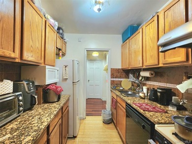 Welcome to unit 1K at 143-07 Sanford Avenue, a well-maintained - photo 16
