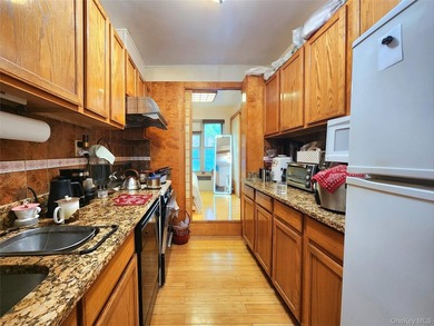 Welcome to unit 1K at 143-07 Sanford Avenue, a well-maintained - photo 18