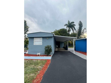 Charming Mobile Home in a community for all ages in Palm Beach - photo 1