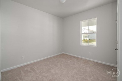 The Dunlin floorplan features an open, easy-living layout in a - photo 12