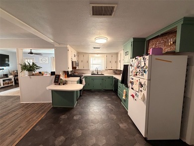 Updated home for the family with additional living area added to - photo 16