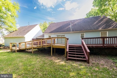 Spacious and inviting, this oversized Cape Cod offers 1900 - photo 24