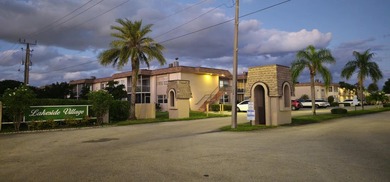 Beautiful BAHAMAS STYLE, 1BD/1.5BA ground-floor condo in a - photo 2