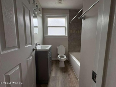 Completely remodeled and move-in ready! This charming 3-bedroom - photo 4