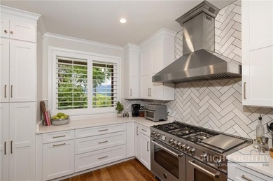 Tucked inside a serene, wooded oasis within the premier Elk - photo 12