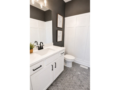 Custom designed two-story residence featuring a walk-out - photo 13