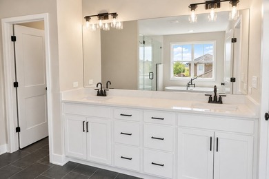 Custom designed two-story residence featuring a walk-out - photo 22