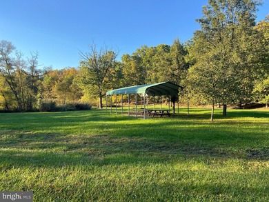 REDUCED!!! PRICE FIRM! This cabin is uniquely perched atop a - photo 20