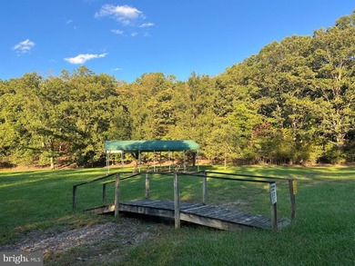 REDUCED!!! PRICE FIRM! This cabin is uniquely perched atop a - photo 22