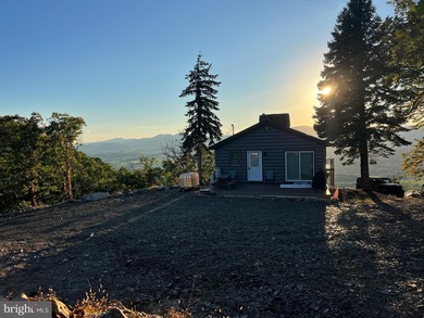 REDUCED!!! PRICE FIRM! This cabin is uniquely perched atop a - photo 26