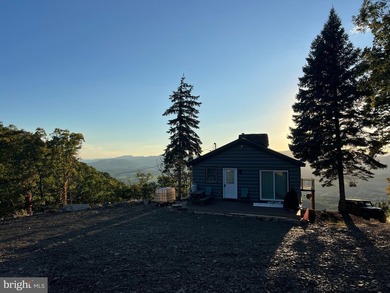 REDUCED!!! PRICE FIRM! This cabin is uniquely perched atop a - photo 27