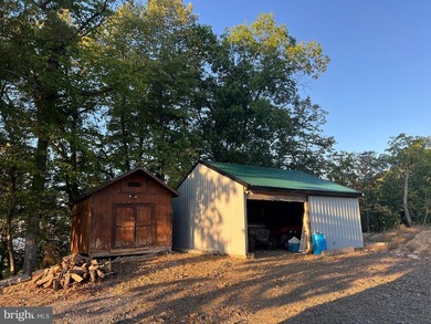 REDUCED!!! PRICE FIRM! This cabin is uniquely perched atop a - photo 30