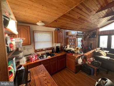 REDUCED!!! PRICE FIRM! This cabin is uniquely perched atop a - photo 34