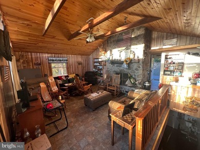 REDUCED!!! PRICE FIRM! This cabin is uniquely perched atop a - photo 36