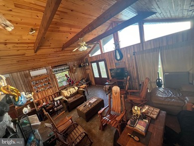 REDUCED!!! PRICE FIRM! This cabin is uniquely perched atop a - photo 38