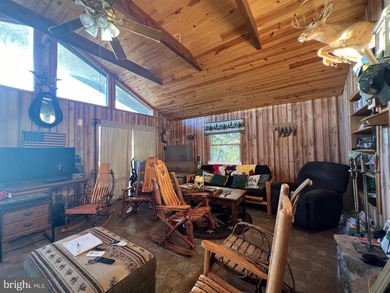 REDUCED!!! PRICE FIRM! This cabin is uniquely perched atop a - photo 40