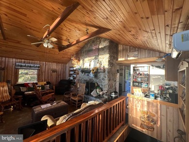 REDUCED!!! PRICE FIRM! This cabin is uniquely perched atop a - photo 41