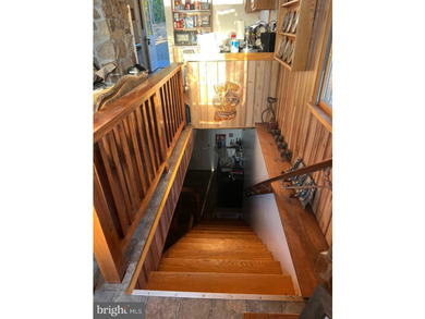 REDUCED!!! PRICE FIRM! This cabin is uniquely perched atop a - photo 42