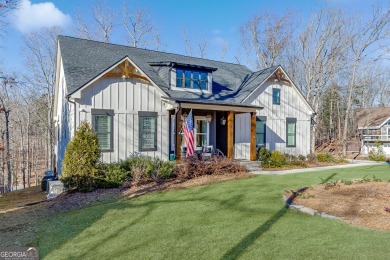 Lake Home For Sale in Flowery Branch, Georgia