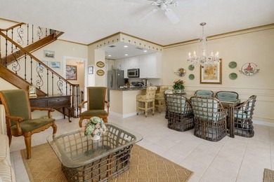 Nestled in the highly sought-after Tequesta Oaks community, this - photo 2