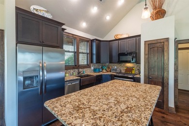Nestled on a private cove of pristine Bear Creek Lake in the - photo 11