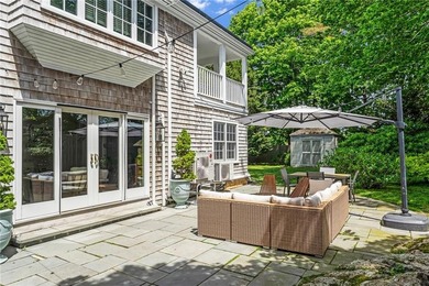 A gracious residence tucked along a picturesque street just off - photo 17