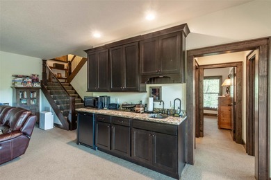 Nestled on a private cove of pristine Bear Creek Lake in the - photo 25