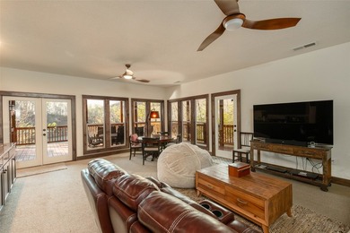 Nestled on a private cove of pristine Bear Creek Lake in the - photo 26