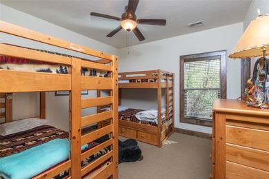 Nestled on a private cove of pristine Bear Creek Lake in the - photo 30
