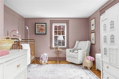 A gracious residence tucked along a picturesque street just off - photo 31
