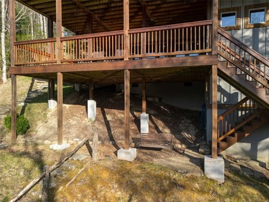 Nestled on a private cove of pristine Bear Creek Lake in the - photo 33