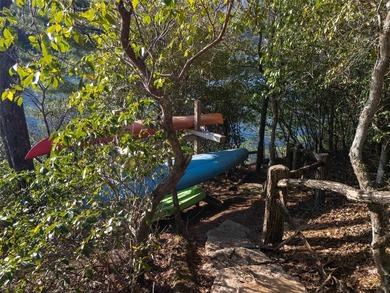 Nestled on a private cove of pristine Bear Creek Lake in the - photo 38