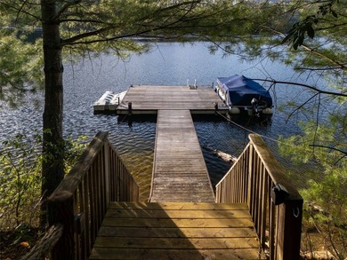 Nestled on a private cove of pristine Bear Creek Lake in the - photo 39