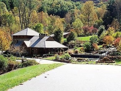 Nestled on a private cove of pristine Bear Creek Lake in the - photo 46