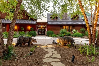 Nestled on a private cove of pristine Bear Creek Lake in the - photo 50