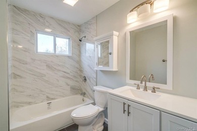Nestled on a quiet, tree-lined cul-de-sac in Northport, this - photo 15