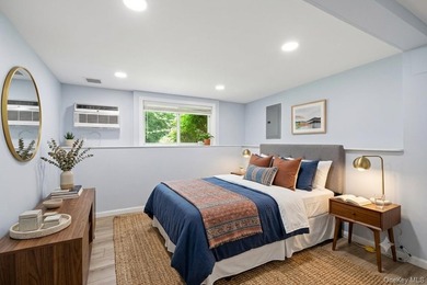 Nestled on a quiet, tree-lined cul-de-sac in Northport, this - photo 30